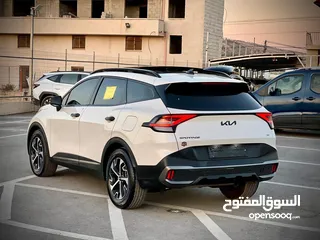  27 كايا سبورتاج /2022 فل الفل فتحة سقف  2x4 ///240Hp بنزين + كهرباء  ( Haybrid) 1600cc