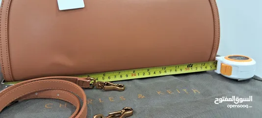  13 tags on new camel handbag unique with detachable strap