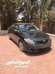  1 تويوتا كورولا 2009 فحص 4 جيد ، وارد امريكي لون اسود ستاندرد