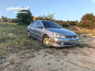  1 ميتسوبيشي لانسر GLX موديل 2007 لون سلفر للبيع