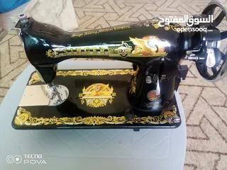  11 ماكينه خياطه سنجر