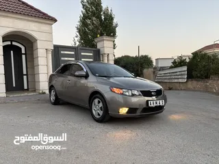  1 كيا فورتي 
2010/2009