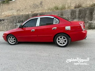  8 سياره هونداي النترا2004 لون احمر