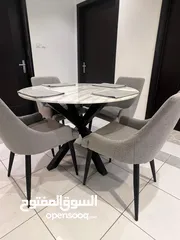  1 Like New Circle Marble with 4 Fabric Chairs