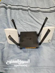  1 TP LINK MODEM AND WIFI EXTENDER FOR SALE WITH WARRANTY