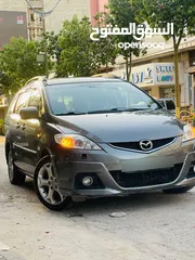 1 مازدا 5 ستيشن بابين سحاب ماتور 2000cc بدون تيربو هيك بجين هضول كراسي اماميات تدفئه كزاز كهرباء بنزين