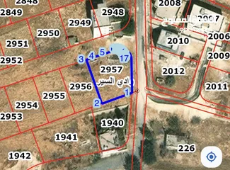  1 ارض سكنية للبيع في الدربيات مساحة 606م (على شارعين)