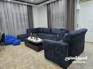  2 كورنر 9 مقاعد تفصيل حرف L ومجوزه مع طاوله وسط خشب زان اسفنج دانلوب و ظهر متحرك كامل  ،، مقاعد عريض