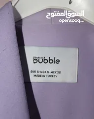  4 طقم نسائي كلاسيكي بلون لافندر بلمسة عصرية وتفاصيل بيضاء أنيقة