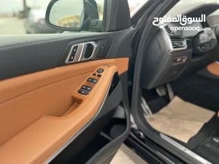  12 بي ام دبليو X5 لون اسود موديل 2022 Mكيت فل كامل فحص كامل وارد وكاله عمان