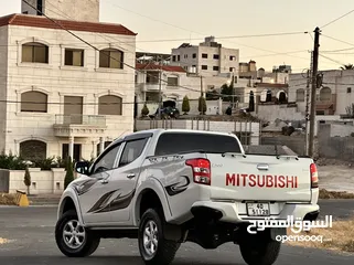  9 ميتسوبيشي L200 2016 لون ابيض مميزه فحص كامل كرت ابيض دفع رباعي 4x4