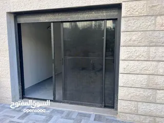  1 شقه للبيع في عين منجد  طابق ارضي مع حديقه