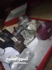  5 علب عطور فاضيه رجاليه او نسائيه