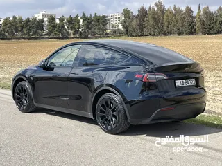  26 Tesla model y 2023 long range Dual motor  فحص اوتوسكور b+ 80 السيارة وكالة  السيارة 7 مقاعد