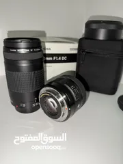  2 عدسة سيجما 30mmf1.4 + عدسة زوم 75-300