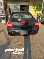 5 كيا تشوما موديل 1999