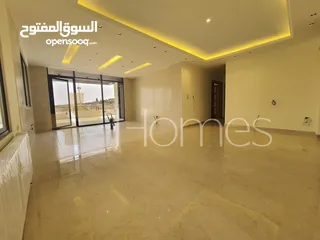  5 شقة ارضية مع ترس للبيع في رجم عميش بمساحة بناء 215م