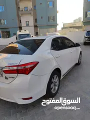  1 Toyota Corolla 2015///2000 cc شرط  الفحص