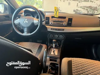  8 متسوبيشي لانسر 2012سيارة جديدة من ناحية مطور وجير وعلى الفحص