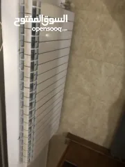  12 ماطور تدفئة مركزية مع خزان سولار مع الراديترات (المشعاعات)