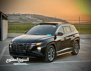  5 هونداي توسان/2022 فل الفل فتحة سقف بانوراما  2x4 ///240Hp بنزين + كهرباء  ( Haybrid) 1600cc