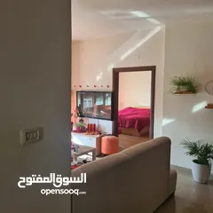  2 شقة في عمارة عائلية للبيع في إسكان الضباط مرج الحمام. شارع جانبي هادئ