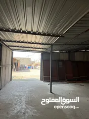  10 مخازن على شارع رئيسي مع هنجر كبير