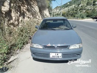  1 اللهم صلي على سيدنا محمد لانسر ال 1993 سياره معروفه اقتصاديه محرك 1500 صينيه ودسك جداد حيلها فيها
