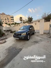  1 جيب كيا سرنتو موديل 2009 خالي من الضربات موتور وقير الف افحص وين بدك