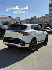  12 كيا سبورتاج GT Line ترخيص 2022 محرك 1600 هايبرد plug in/يقطع على الشحنه 65 كيلو متر  271 حصان