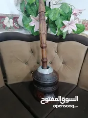 2 محماسه من النحاس الصافي ومهباش خشب وجنبيتين حلوات