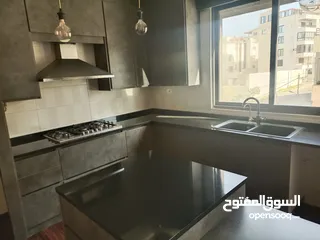  17 شقة فاخرة مع روف الجبيهة ضاحية الرشيد قرب دوار الجاذبية 180م مع روف غير مبني اطلالة رائعة جدا