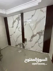  2 دهين مصري محترف بخبره كبيره في مجال الدهان و الديكورات وتركيب ورق الجدران وبديل الخشب وبديل الرخام ؟