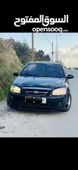  1 كيا سيراتو 2006 بنزين سياره بالصلاه على النبي مش ناقصها اشي ..............