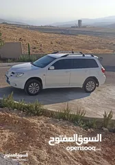  4 ميتسوبيشي اوتلاندر 2006 بحالة ممتازة جداً   6800 قابل للتفاوض