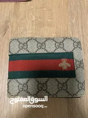  1 Gucci wallet