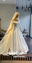  3 فستان زفاف ايفوري
