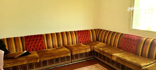  1 12 seater Sofa with the carpet And 3 tables free included