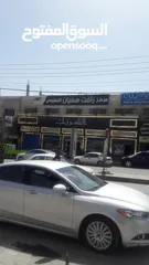  16 ثلاثة محلات تجارية للإيجار بدون خلو في موقع مميز في الزرقاء السوق التجاري قرب دوار معصوم شارع رئيسي