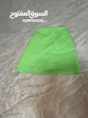  1 تنوره خضراء قصيره