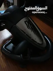  5 a pxn simulator pack with a steering wheel and a pedals with a gear shifter