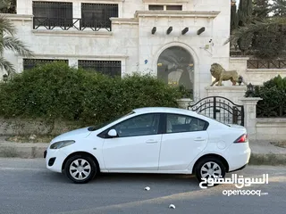  1 مازدا زوم 2 موديل 2012 فحص كامل 7 جيد ولا ملاحظة لون ابيض قاطعة مسافة 100 الف كيلو فقط (استخدام شخصي