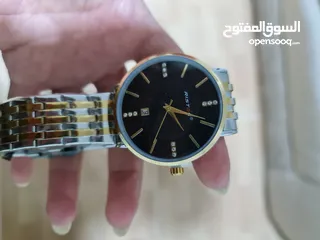  1 ساعة ريستوس فضي ذهبي