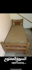  1 سرير خشبي نفر