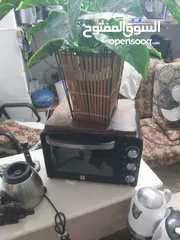  1 فرن كهربائي لتسخين والشوي