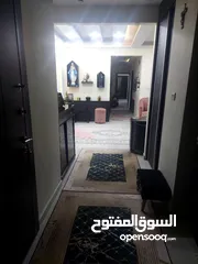  10 شقه ارضيه بشارع الاردن حي المنصور 176متر داخلي وخارجي 100
