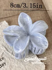  2 مشبك شعر على شكل زهره - اناقه  مميزه لاطلالتك مع المشبك الرائع مصنوعه من خامه عاليه و ألوان ناعمه