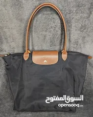  1 Longchamp bag, M