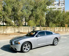  1 A Very Well Maintained DODGE CHARGER 2014 SILVER GCC SXT Edition With Sunroof