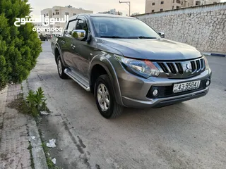  2 متسوبيشي l200 2018 بحالة الوكالة فحص كامل بدون ملاحضات وفل كامل بدون جير ماشي 60000